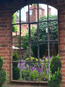 Flush wall mounted to offer a beautiful garden reflection