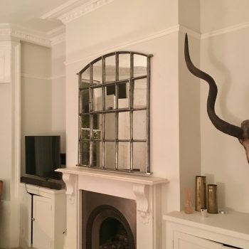 Hand Polished Slow Arch positioned Over Mantle makes a great interior statement