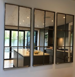Set of 3 Panelled Hand Polished Mirror Panels wall hung to bring the outside in to our clients open plan kitchen area