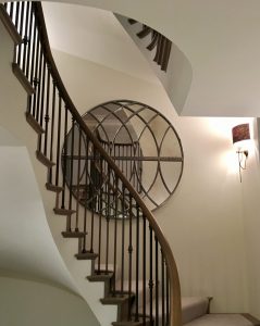 Swirls of Ironwork on this Belgian Mirror reflecting our clients decorative stairway detail