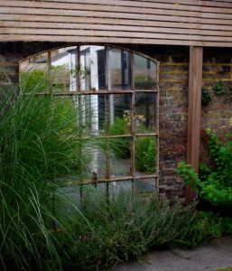 Large Slow Arch Mirror with great planting surround