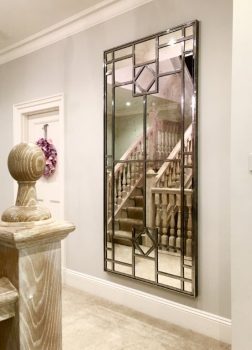 Vintage Art Deco Style mirror positioned to reflect our clients stairway detail