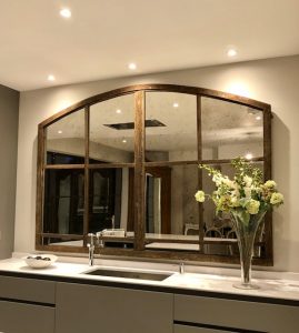 Large Slow Arch Architectural Mirror reflecting clients kitchen space