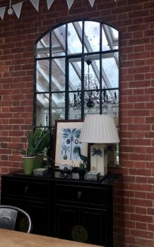 Architectural Mirror with dark aged tones works well in our clients conservatory space