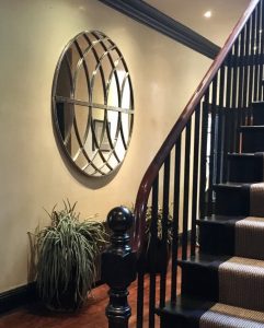 Beautiful Swirls of Elegant iron work on this large Circular Mirror make for a very special interior design feature