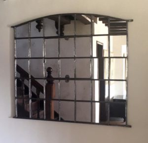 Large Slow Arch paneled mirror flush wall mounted with our special unseen wall fixings