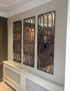 Decorative Polished Architectural Mirror Panels display in this hotel reception area