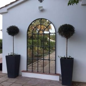 Tall Full Arch Mirror hand painted to our clients specification and now displayed in their Spanish Villa