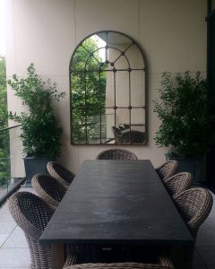 Tall Full Arch with exceptional Decorative Bose detail, positioned to bring the tree life into our clients balcony area