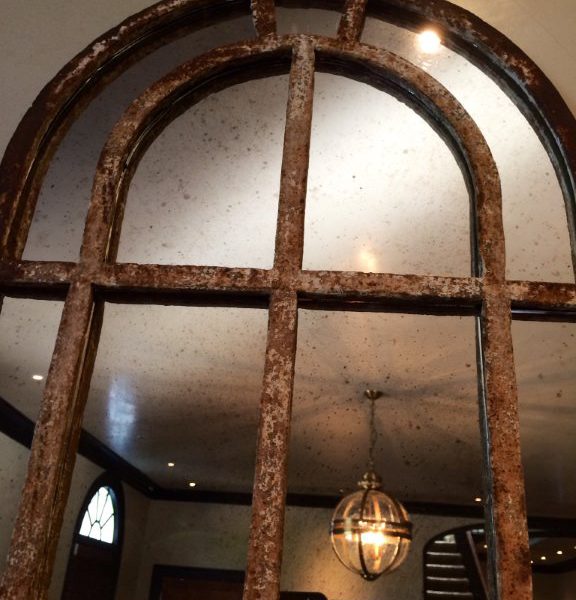 A pair of Slim Arch Architectural Reclaimed Window Mirrors