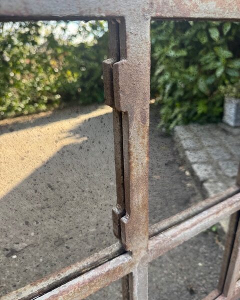 Greyish-Ristic-garden-mirror